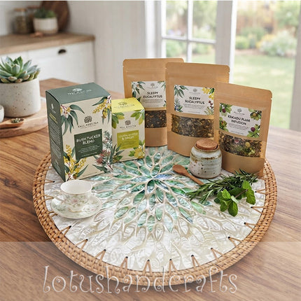 Handwoven rattan edging frames the striking emerald leaf pattern, creating a warm and natural table setting accent.