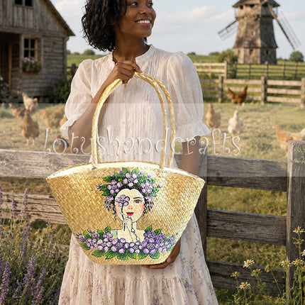 Handwoven seagrass tote bag with hand painted floral lady artwork.