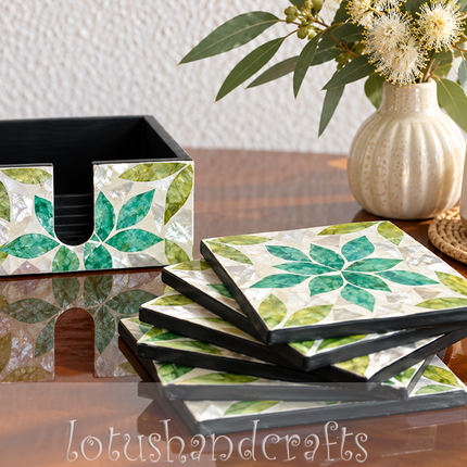 complete coaster set with holder featuring lotus and leaf motifs.