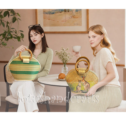 Handmade half moon seagrass straw tote bag with rattan handle and hand painted two kangaroos.