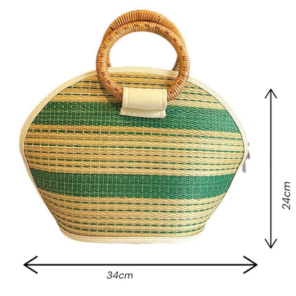 Handmade seagrass half moon woven tote bag with rattan handle.