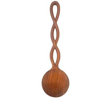 A cute hand carved twisted long handle wooden spoon designed for everyday kitchen use.