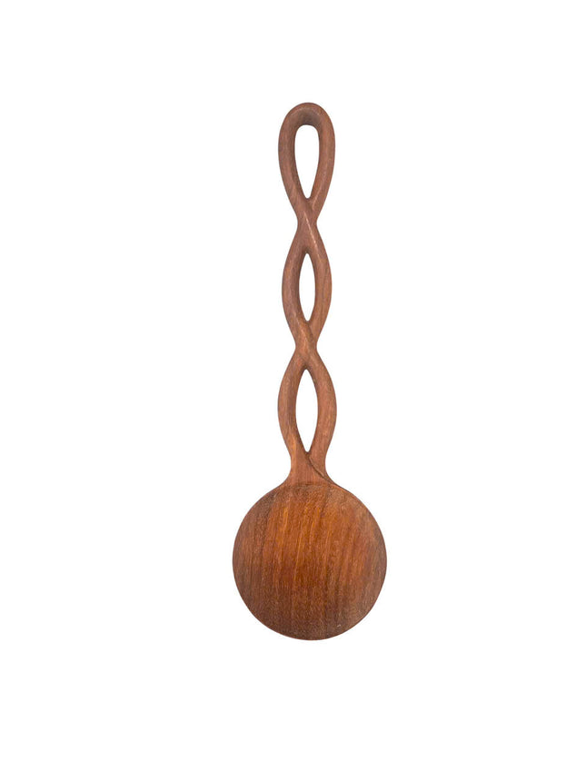 A cute hand carved twisted long handle wooden spoon designed for everyday kitchen use.