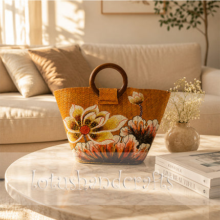 Handwoven seagrass tote bag with stylish hand painted blooming floral.