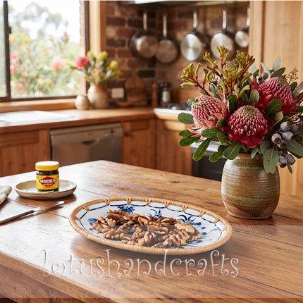 A beautiful combination of blue lotus motifs, white ceramic, and natural rattan creates a timeless look.