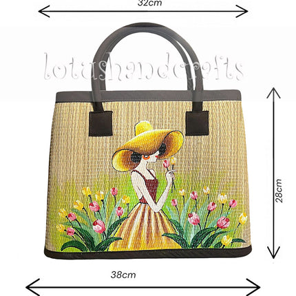 Handwoven seagrass tote bag with hand-painted girl in tulip garden, 38 cm x 28 cm.