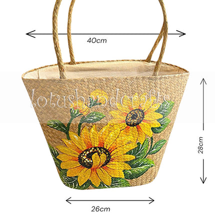 Handwoven seagrass tote bag with hand-painted sunflower artwork.