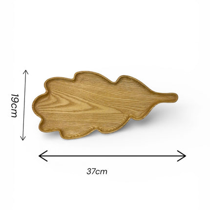 Handcarved ash wood oak leaf serving tray with a beautiful natural shape and elegant size.