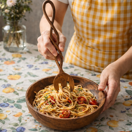 Twisted long handle wooden salad fork made from natural wood for elegant serving.
