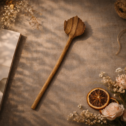 Hand carved leaf wooden salad spoon from size small to large suitable for mixing serving and decorating fresh salads beautifully.