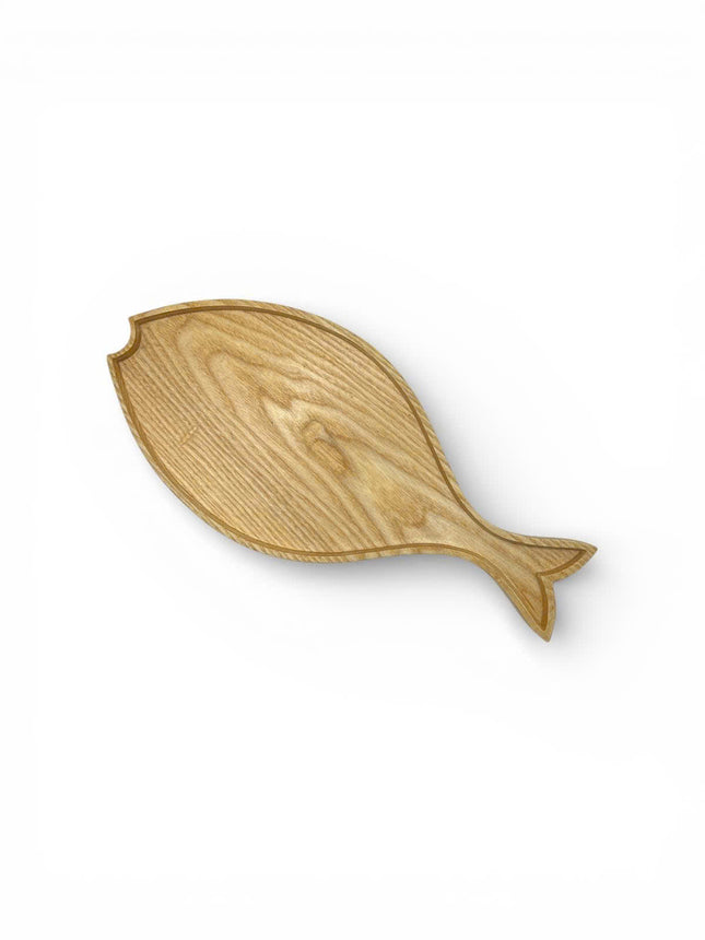 Handcrafted ashwood fish tray is a cute and elegant serving piece for everyday use.