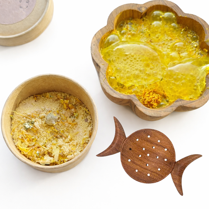 Handcrafted crescent moon magic strainer made from natural wood for everyday use.