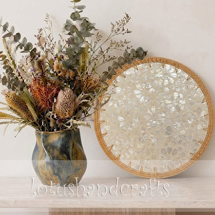 Round Rattan Mother of Pearl Floral Mosaic Placemat by Lotushandcrafts. 