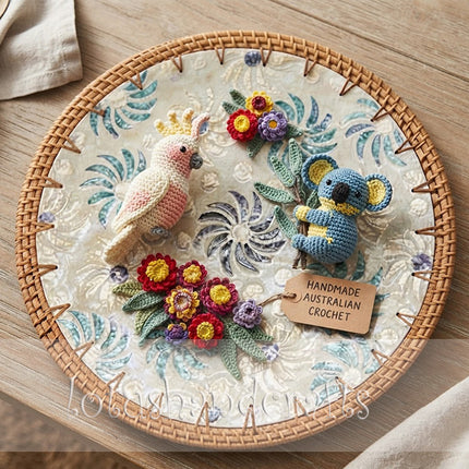 Elegant coastal-inspired table accent featuring swirling blue-green flowers, natural rattan texture, and subtle mother of pearl shimmer.