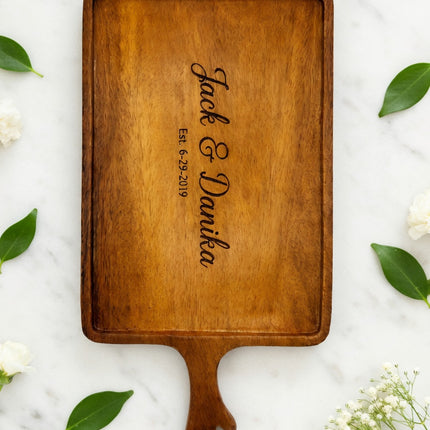 Handcrafted wooden serving tray handle board with custom name engraving available.