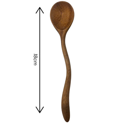 Handmade wooden spoon crafted with wavy design offers natural beauty durability and perfect size for everyday kitchen use.