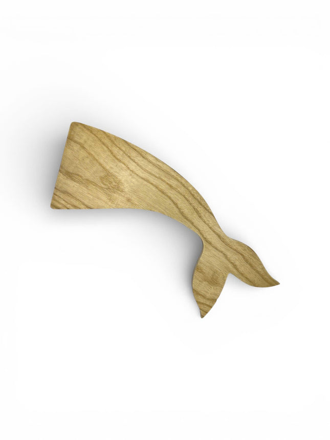 Handcrafted wooden whale tail shape tray with a cute design perfect for everyday use.