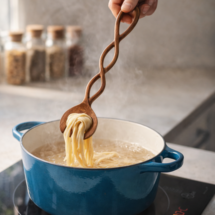 Cute twist handle wooden salad fork designed for eco friendly and sustainable kitchen use.