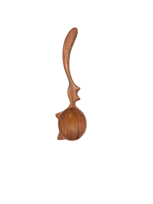 Cat shaped wooden spoon made from natural wood brings charm and durability for kitchen use.