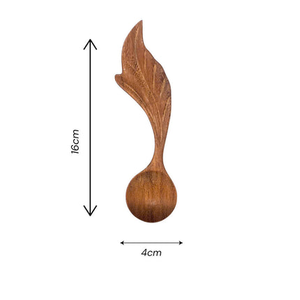 Handmade floating leaf wooden spoon with a compact size perfect for everyday use and display.
