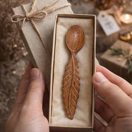 Hand carved leaf shaped wooden spoon with a cute and charming design, perfect for cooking, serving, and adding a natural touch to your kitchen.