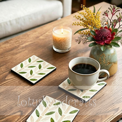 Polished green shell leaves paired with iridescent mother-of-pearl detailing.