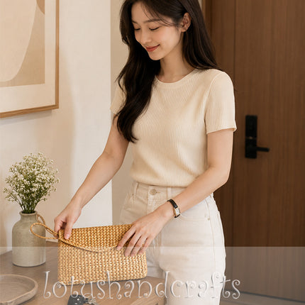 Cute handmade vintage rattan straw clutch bag with unique charm.