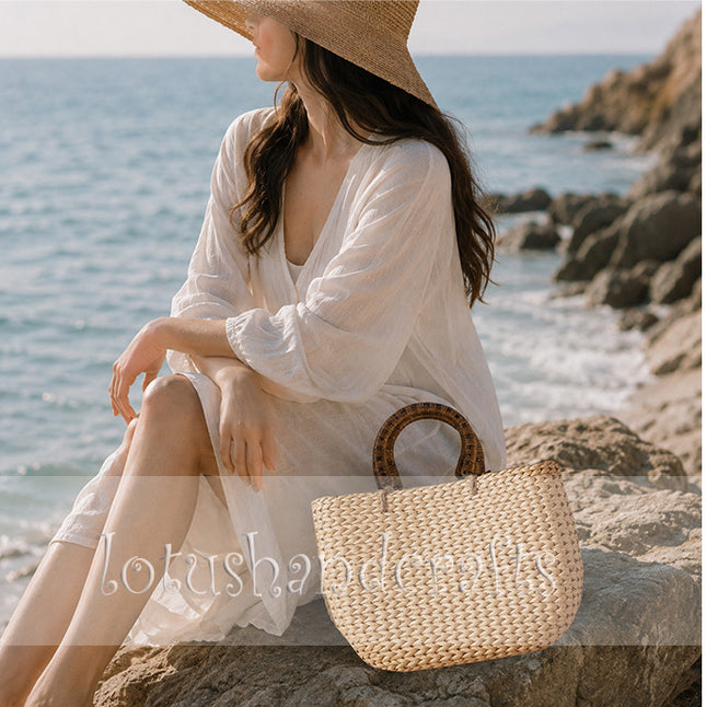 Cute handwoven water hyacinth tote bag with round rattan handles.