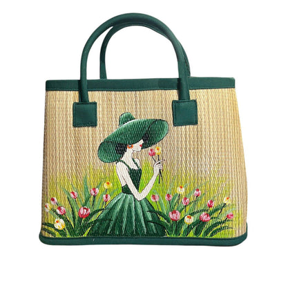 Handmade woven seagrass tote bag featuring elegant green lady artwork.