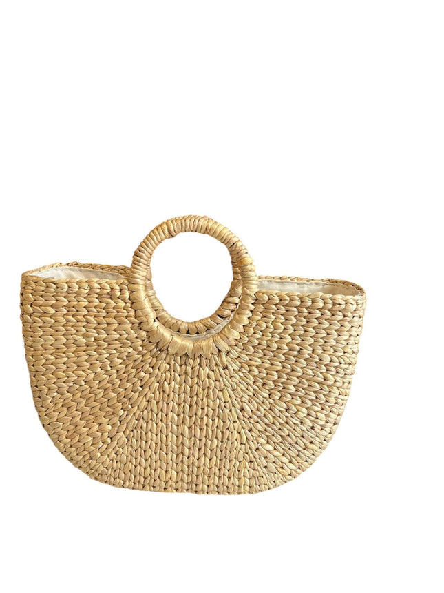 Handwoven half moon seagrass beach tote bag.