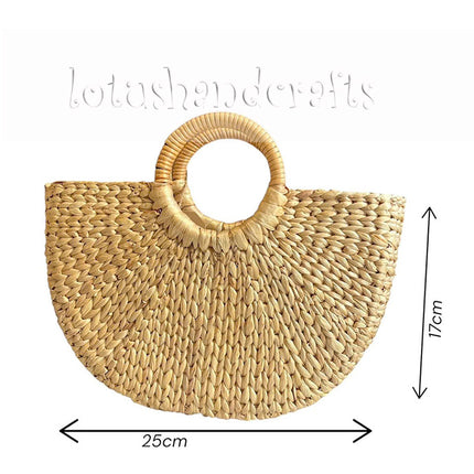 Handwoven half moon seagrass tote bag with round handles size.