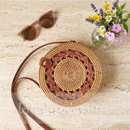 Handcrafted braided mandala round rattan crossbody bag with an elegant and luxurious design.