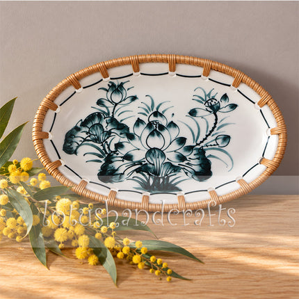 The oval shape highlights the flowing botanical arrangement and delicate hand-painted floral details.