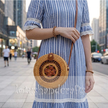 Handwoven vintage round rattan crossbody bag with natural handicraft style and timeless boho charm.