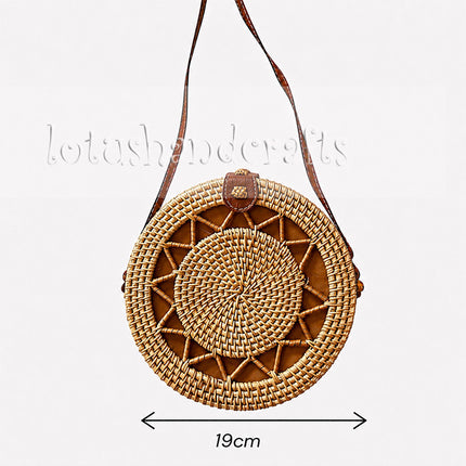 This handwoven round rattan crossbody bag is the perfect size for everyday boho style.