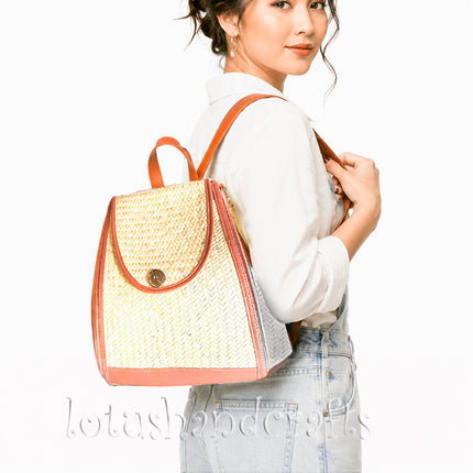 Handwoven Seagrass Backpack with Brown Leather Trim for Women.