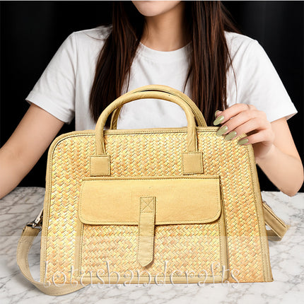 Modern handwoven seagrass briefcase tote bag with a stylish front pocket for everyday elegance.