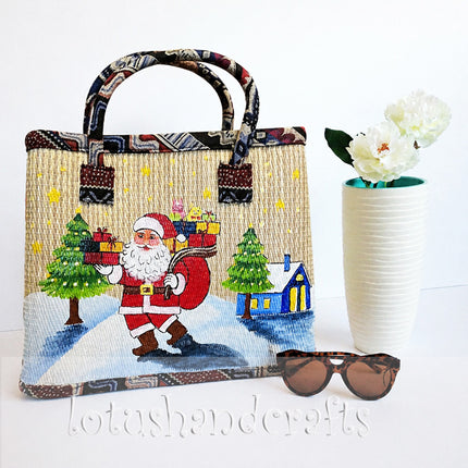 Handwoven seagrass tote bag featuring a Christmas gifts painting.
