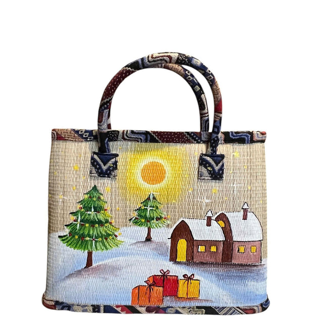 Handmade woven seagrass tote bag with a cute snowy Christmas village painting.