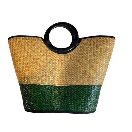 Handwoven seagrass tote bag with round black handles in forest green.