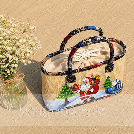 Handwoven seagrass tote bag featuring a festive Christmas gifts painting.