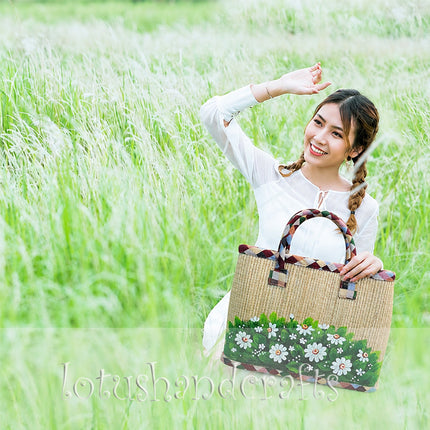 Handwoven Seagrass Tote Bag with a Hand-Painted Wild Daisy Meadow Floral Design.