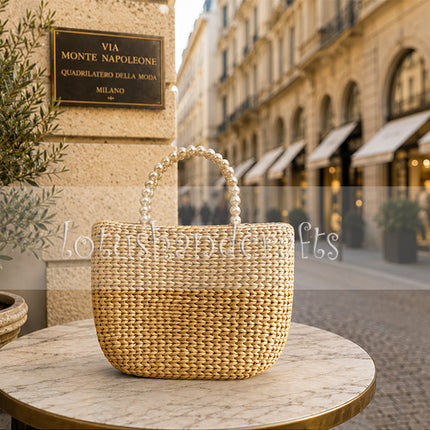 Handwoven water hyacinth tote bag with pearl handles, medium size.
