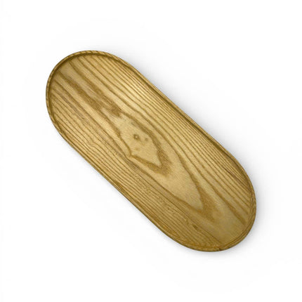 Handcarved haven oval ashwood serving tray with a cute minimalist design for cozy modern living.