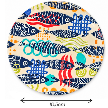 Brighten your home, kitchen, or office with this unique drink coaster, where navy blue, turquoise, red, orange, and green create a harmonious artistic composition.