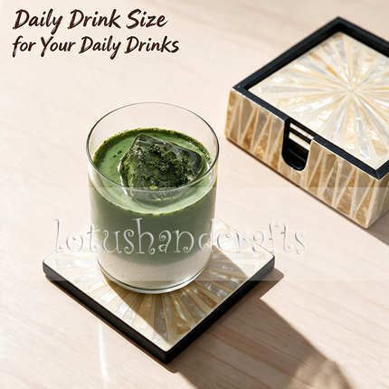 Beautiful mother of pearl coasters featuring a symmetrical starburst pattern that reflects light with a natural pearlescent glow.