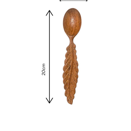 Hand carved leaf shaped wooden spoon with practical size, perfect for cooking, serving, and adding a natural touch to your kitchen.