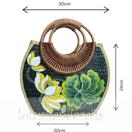 Handwoven rattan bag with hand painted lotus blossom.