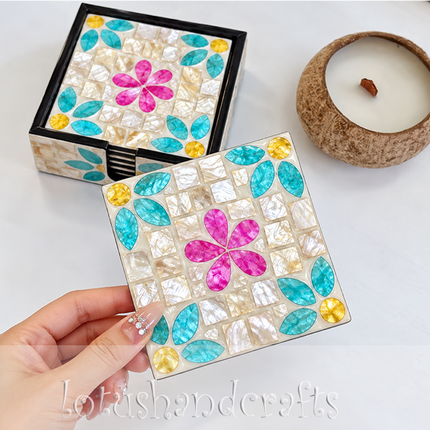cohesive floral mosaic design across coasters and holder — elegant table decor set.