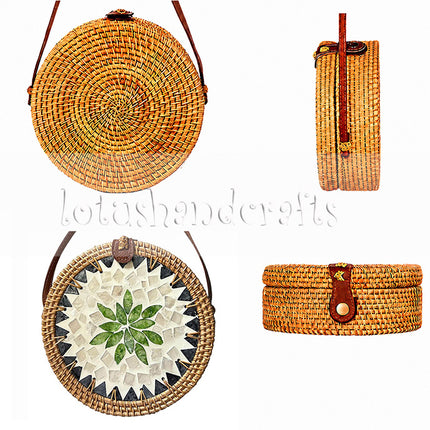 Round rattan crossbody bag with green leaf mother-of-pearl mosaic.